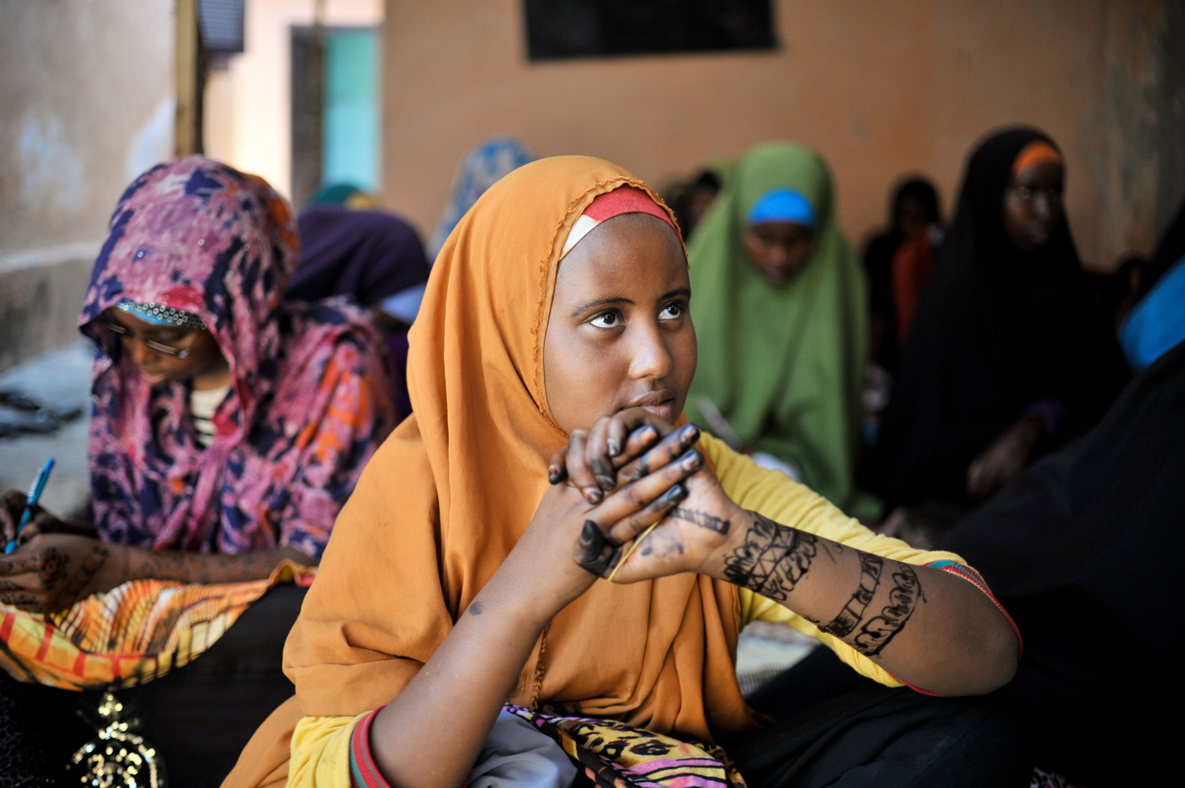 A girl at the Mother and Child Health Center in Mogadishu, Somalia, sits with other girls during a visit by the Special Representative of the Secretary-General on Sexual Violence in Conflict to the hospital on April 2.