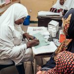 Doctor and patient - WeMUNIZE, USAID Nigeria