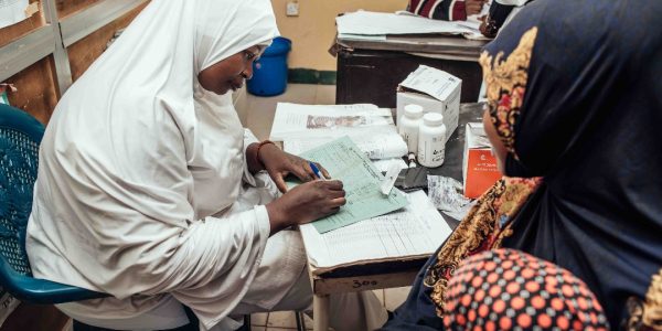 Doctor and patient - WeMUNIZE, USAID Nigeria