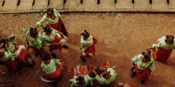 pexels-maduabuchi-kingsley-Group of women in vibrant traditional clothing seen from above, showcasing cultural heritage.
